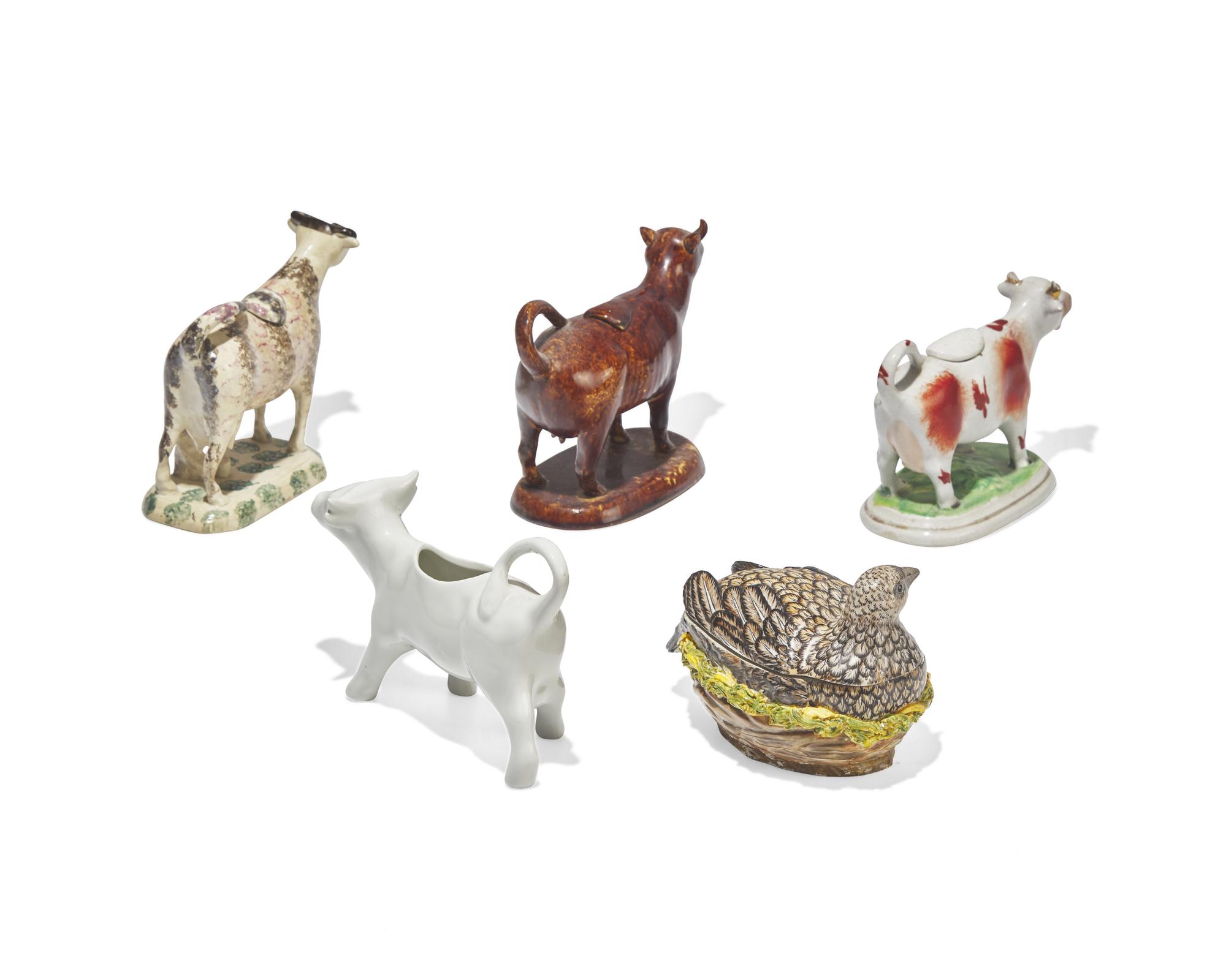 Three Staffordshire Cow-Form Creamers and a Quail-Form Covered Tureen