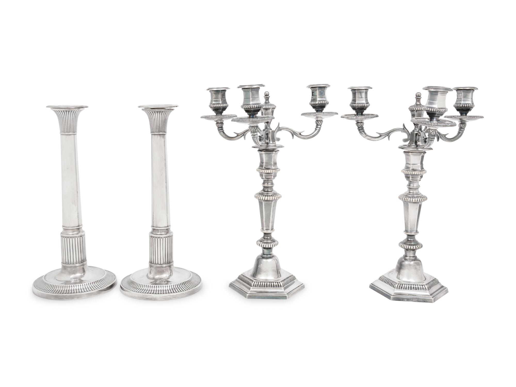 A Pair of George III Silver Candlesticks