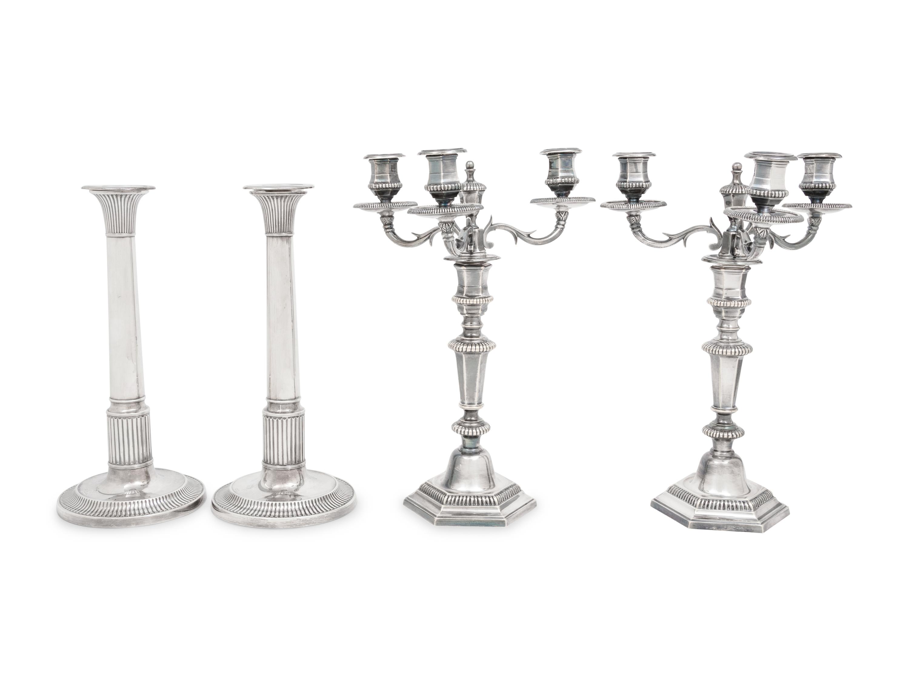A Pair of George III Silver Candlesticks