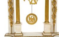 A French Gilt Bronze and White Marble Mantel Clock