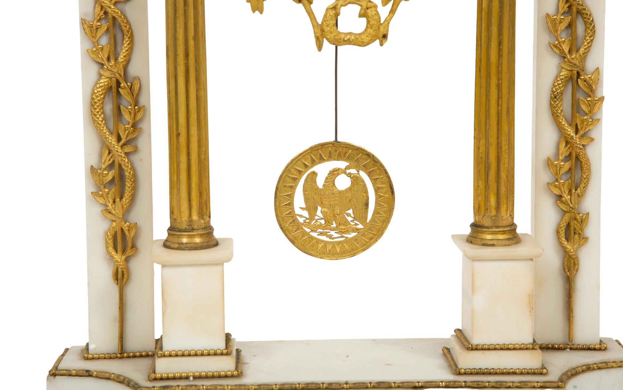 A French Gilt Bronze and White Marble Mantel Clock