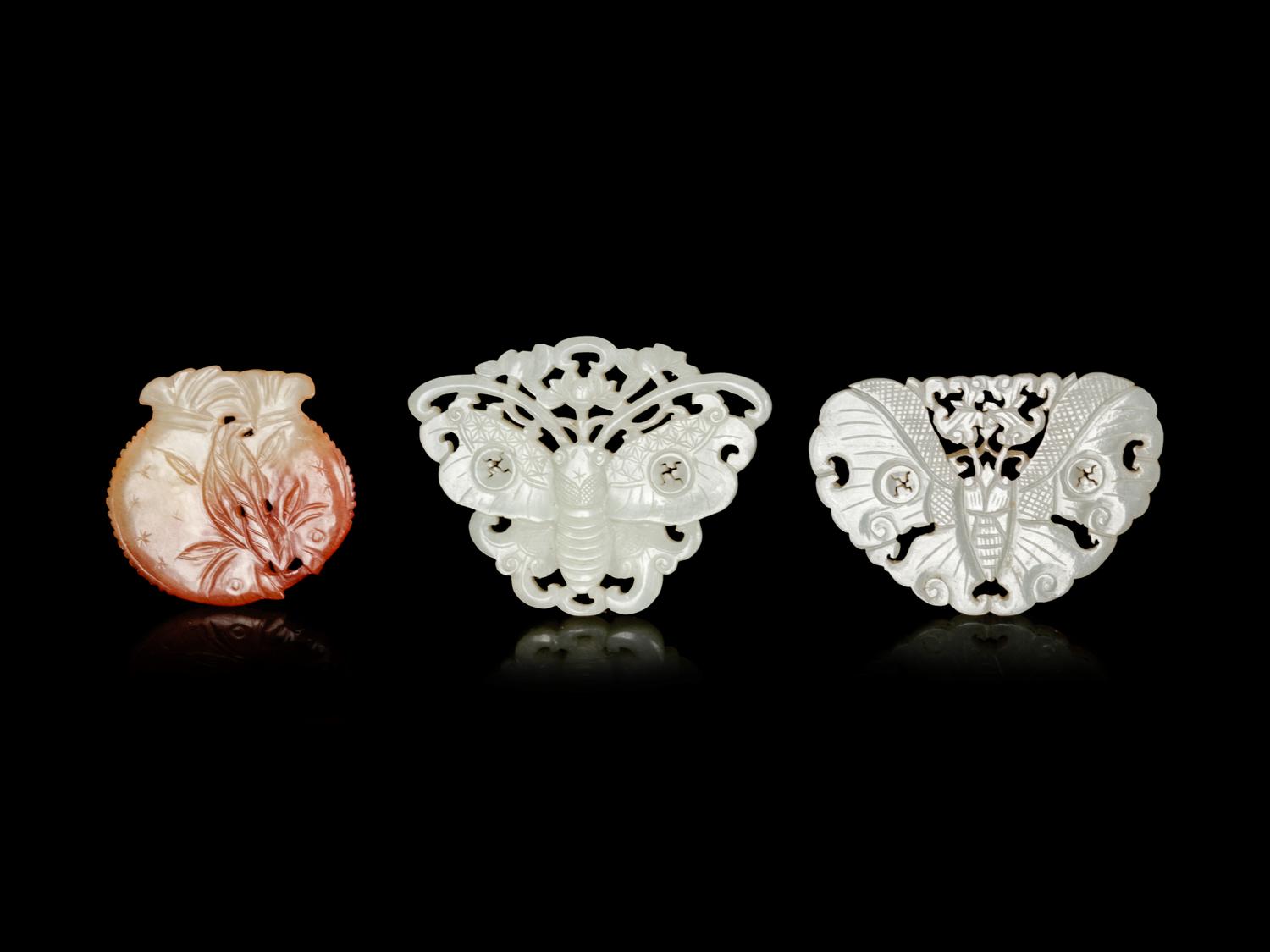 Five Chinese Celadon and Russet Jade Plaques
