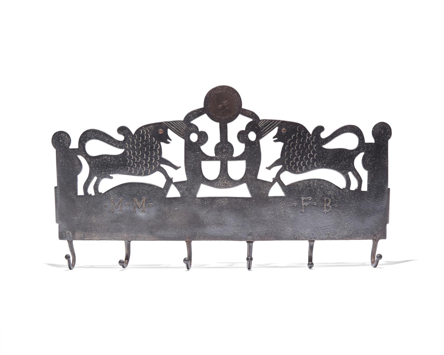 A Copper-Inlaid Wrought Iron Kitchen Wall Rack, French, Early 19th Century