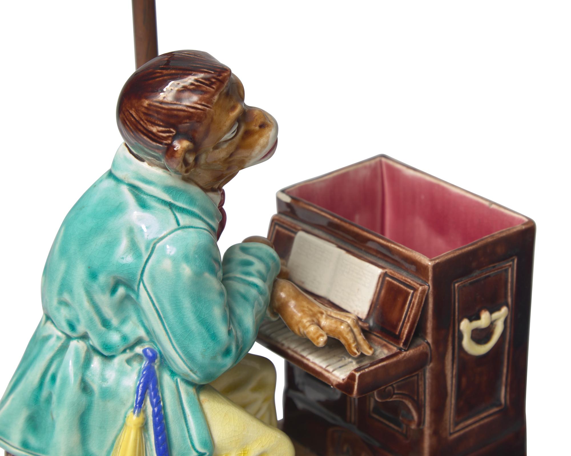 A French Majolica Humidor in the Form of Monkey Playing the Piano, Mounted as a Lamp