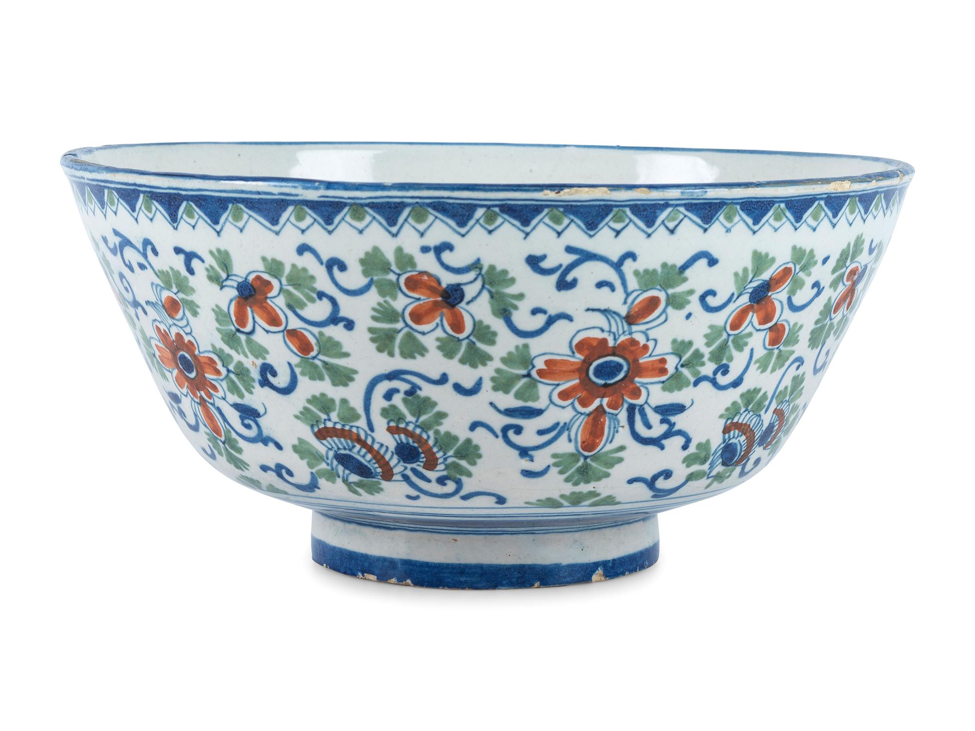 A Dutch Delft Polychrome Glazed Earthenware Punch Bowl