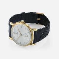 An 18K yellow gold leather strap wristwatch, Rolex Oyster Perpetual Precision