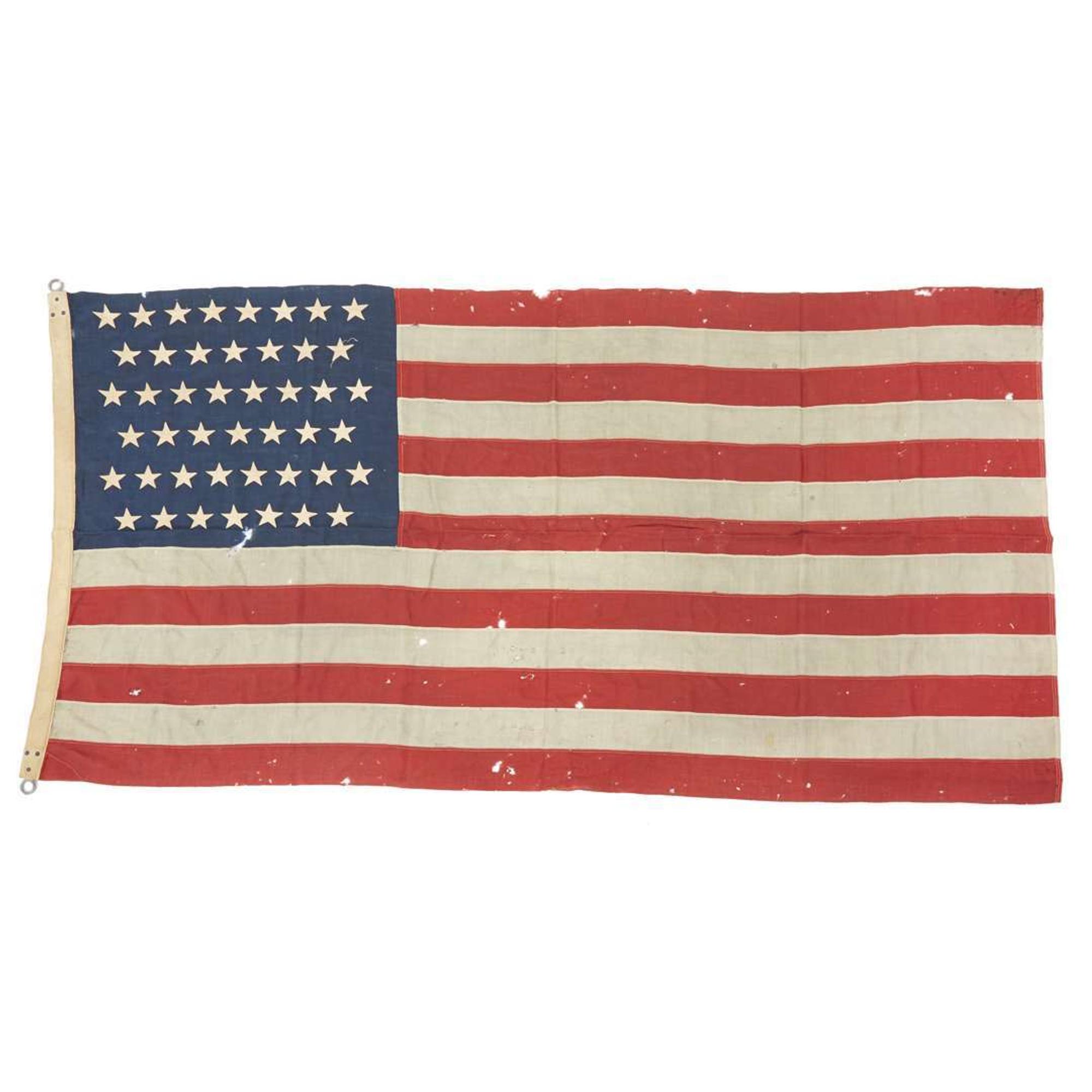 Four 45-Star American Flags and a French Tri-Color Flag O. H. Batchelder & Co., W. M. Horstmann, Philadelphia, and C. W. White Decorator, circa 1898-1900