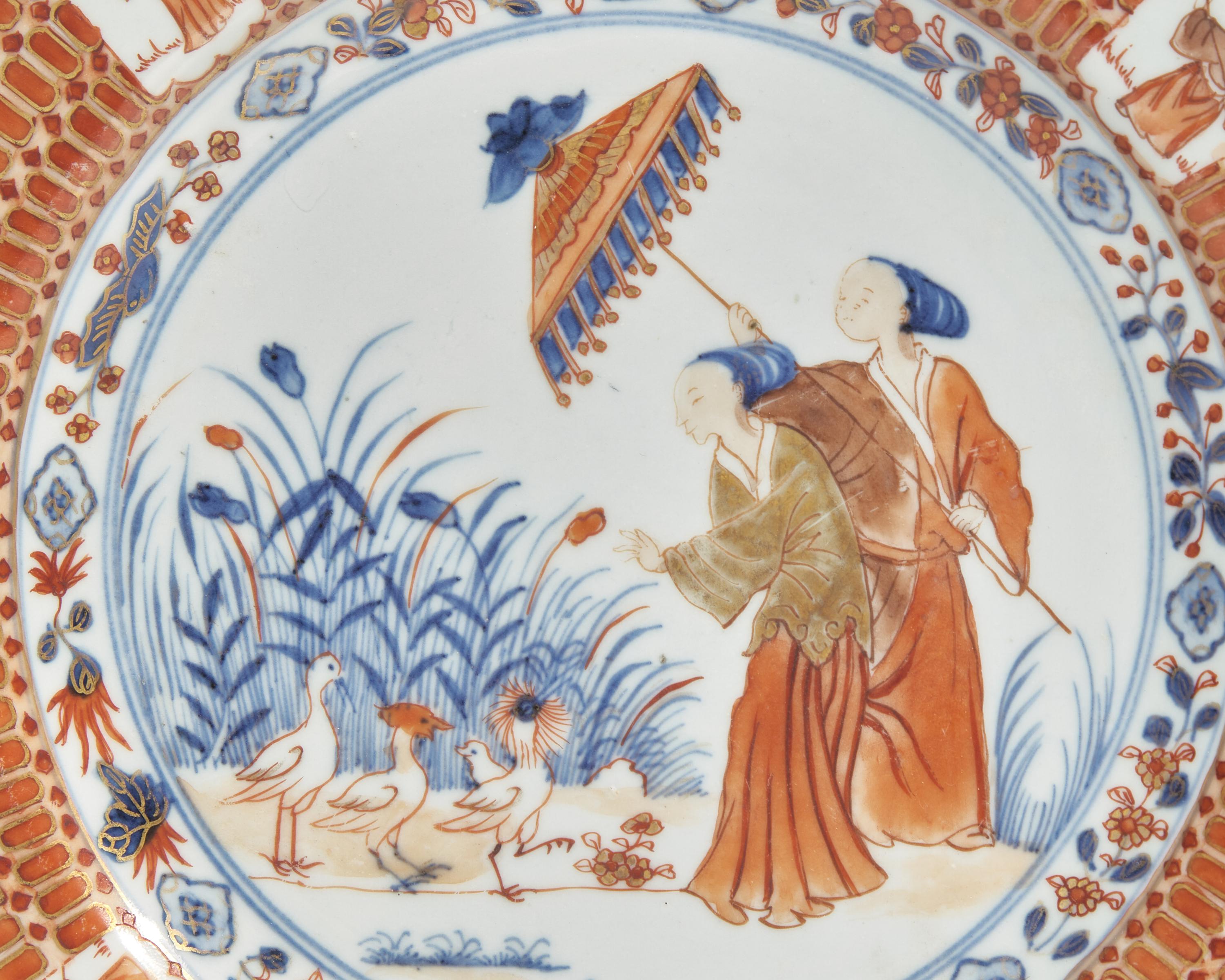 A Chinese Export Porcelain Rouge-De-Fer Plate Depicting "La Dame Au Parasol"
