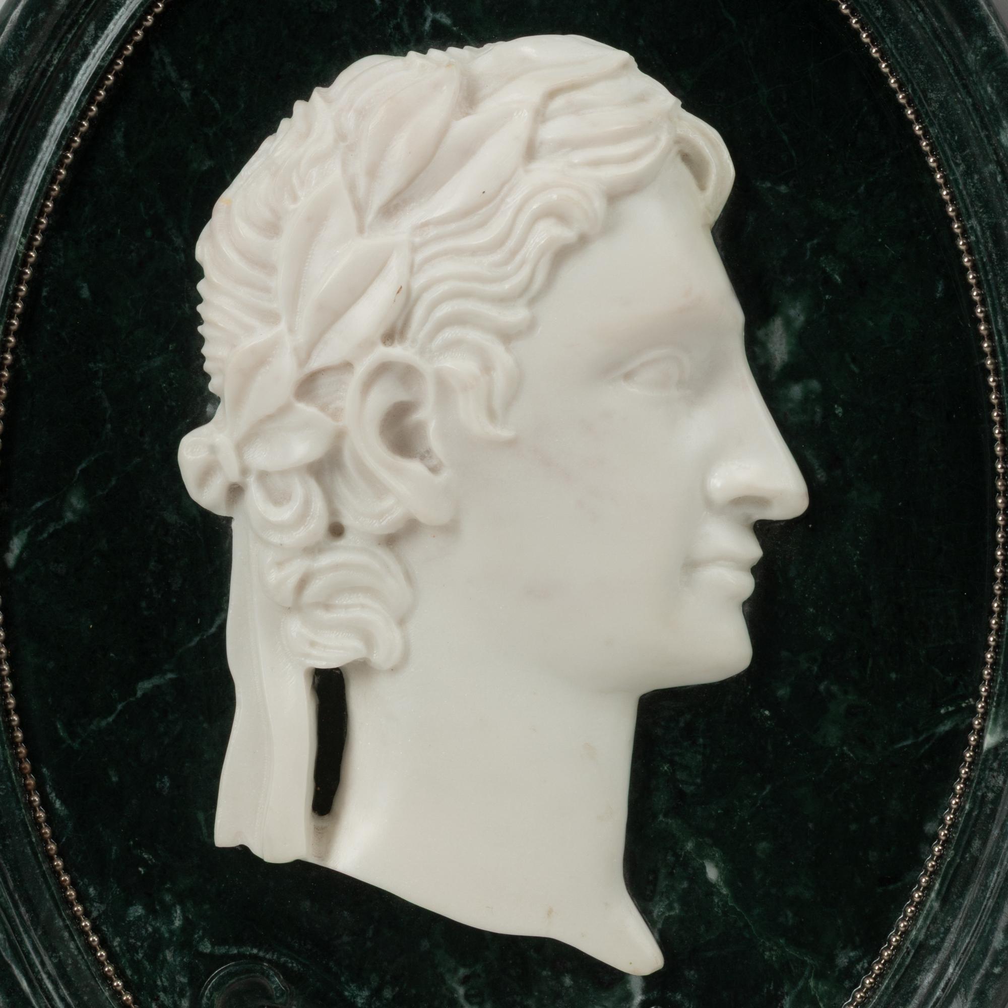 A Set of Four Italian Marble Oval Plaques