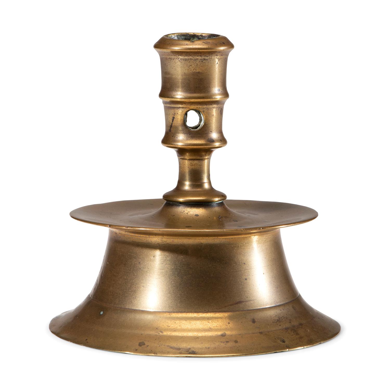 A Dutch Brass Heemskirk Candlestick