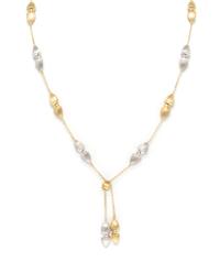 A Pair of 18 Karat White and Yellow Gold Lariat Necklaces, Chiampesan, 14.00 dwts.