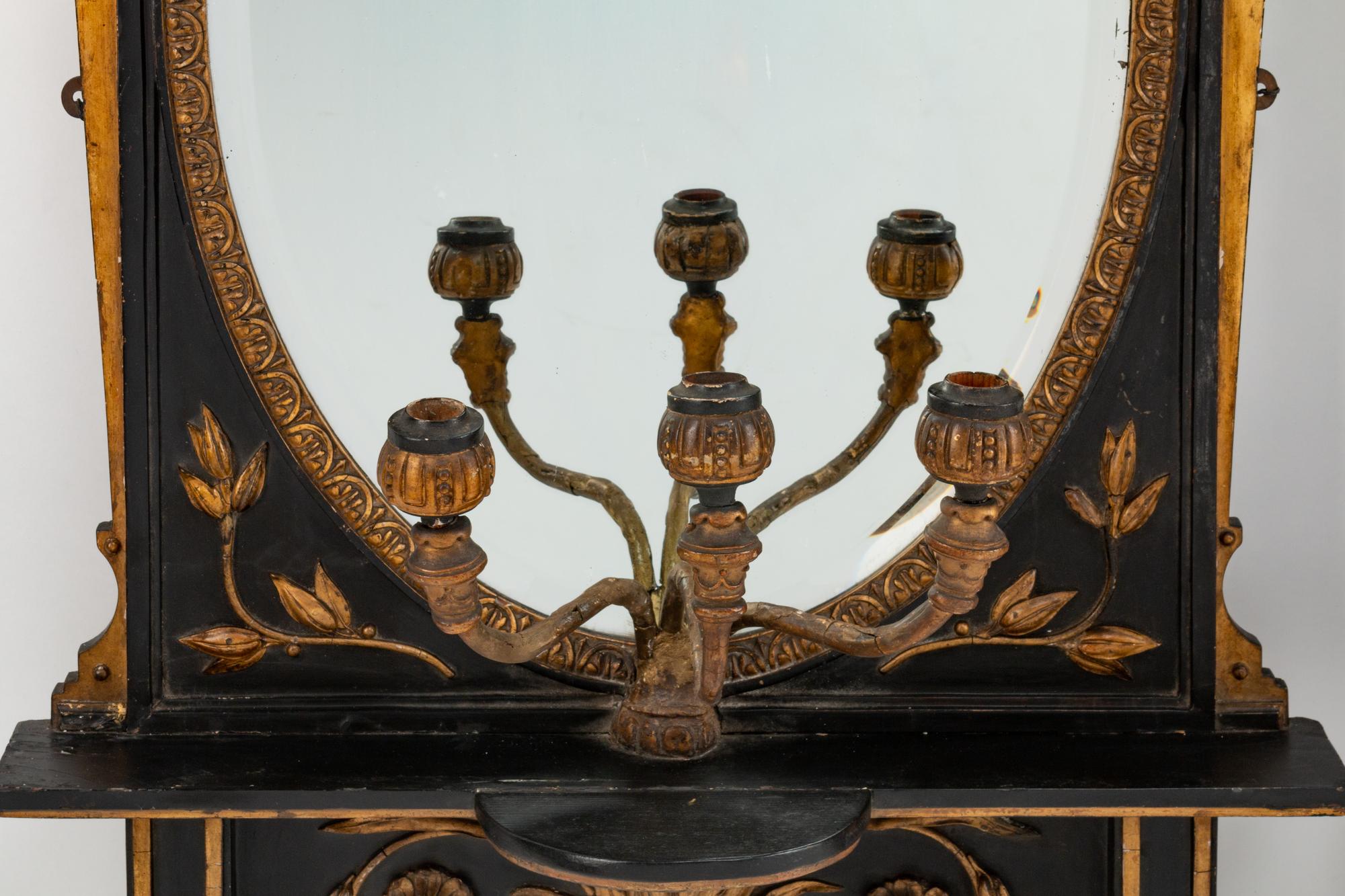 A Pair of English Parcel-Gilt and Ebonized Girandole Mirrors — 19TH CENTURY