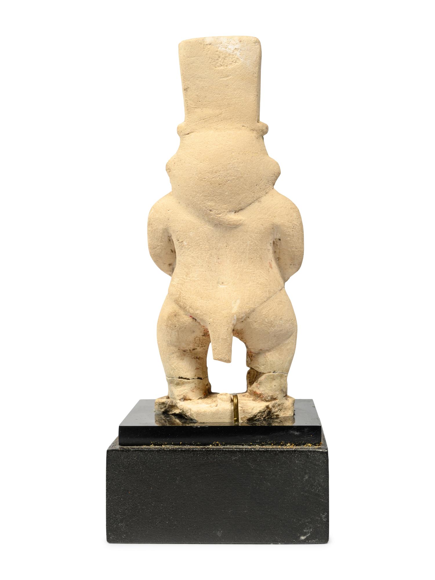 An Egyptian Painted Limestone Bes