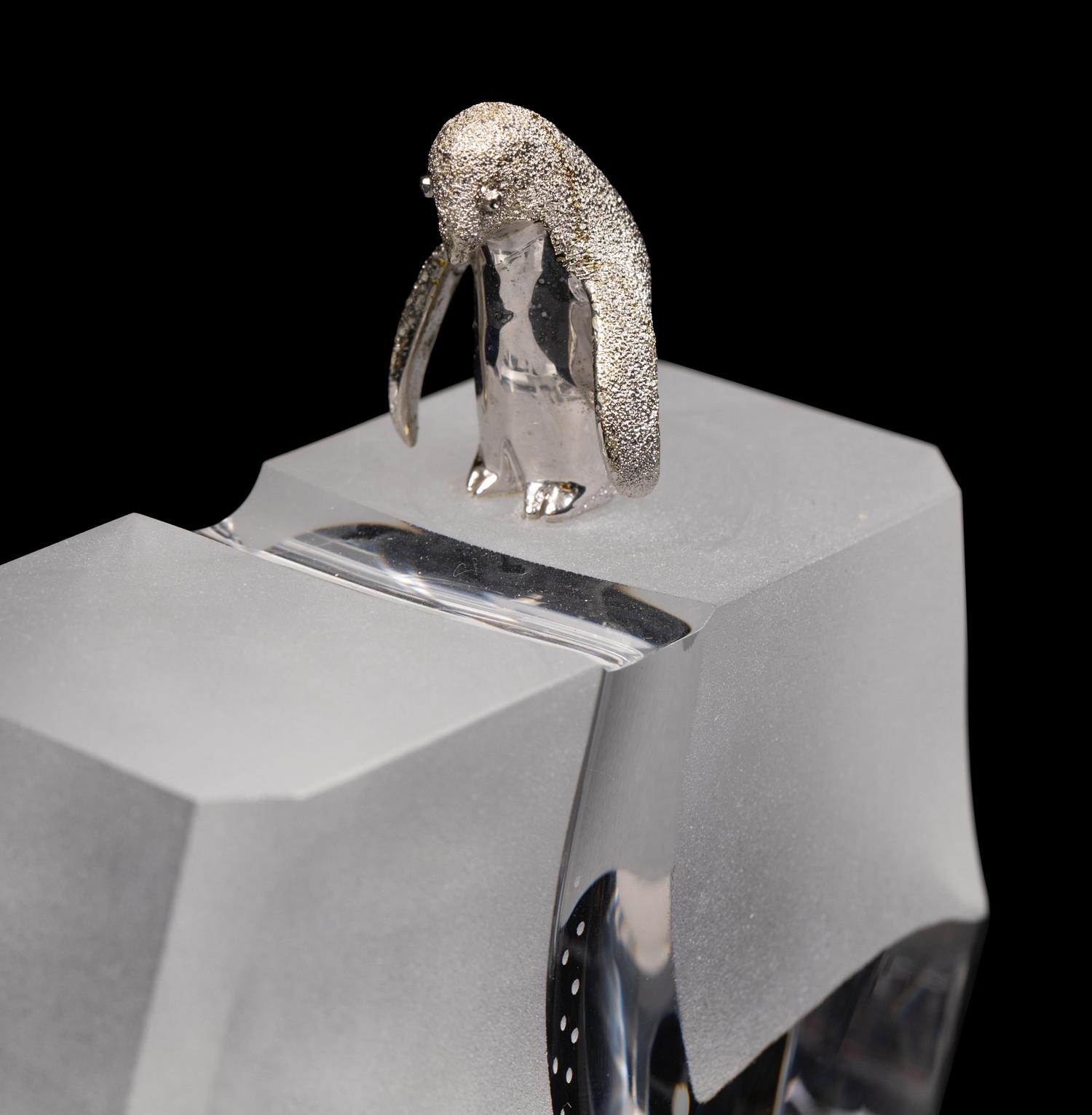 A Steuben Glass and Silver Ice Hunter Sculpture