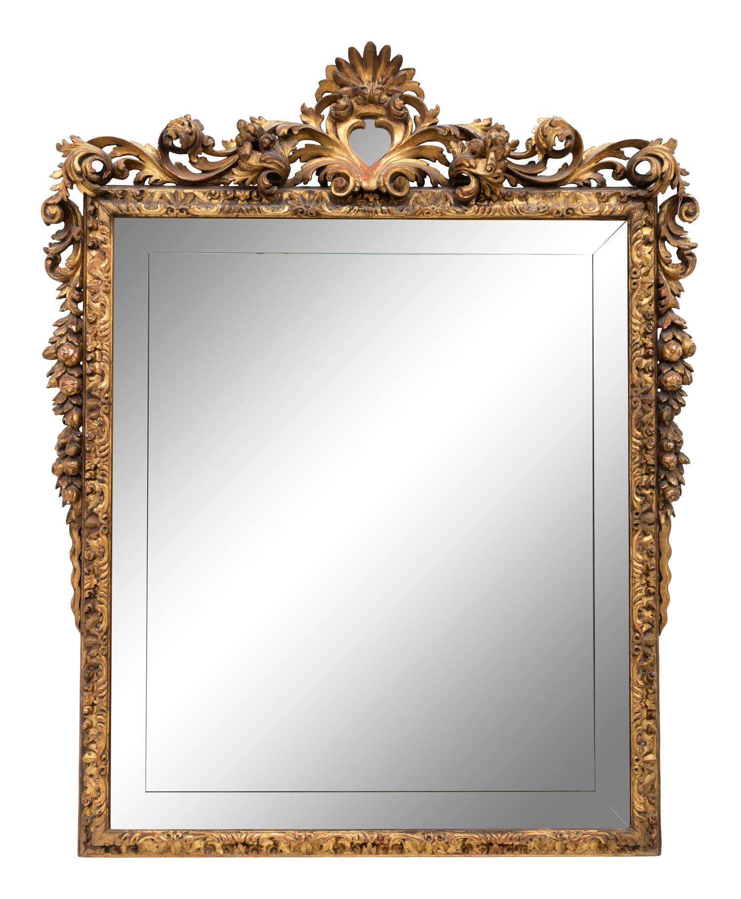 A Large Spanish Baroque Style Giltwood Mirror