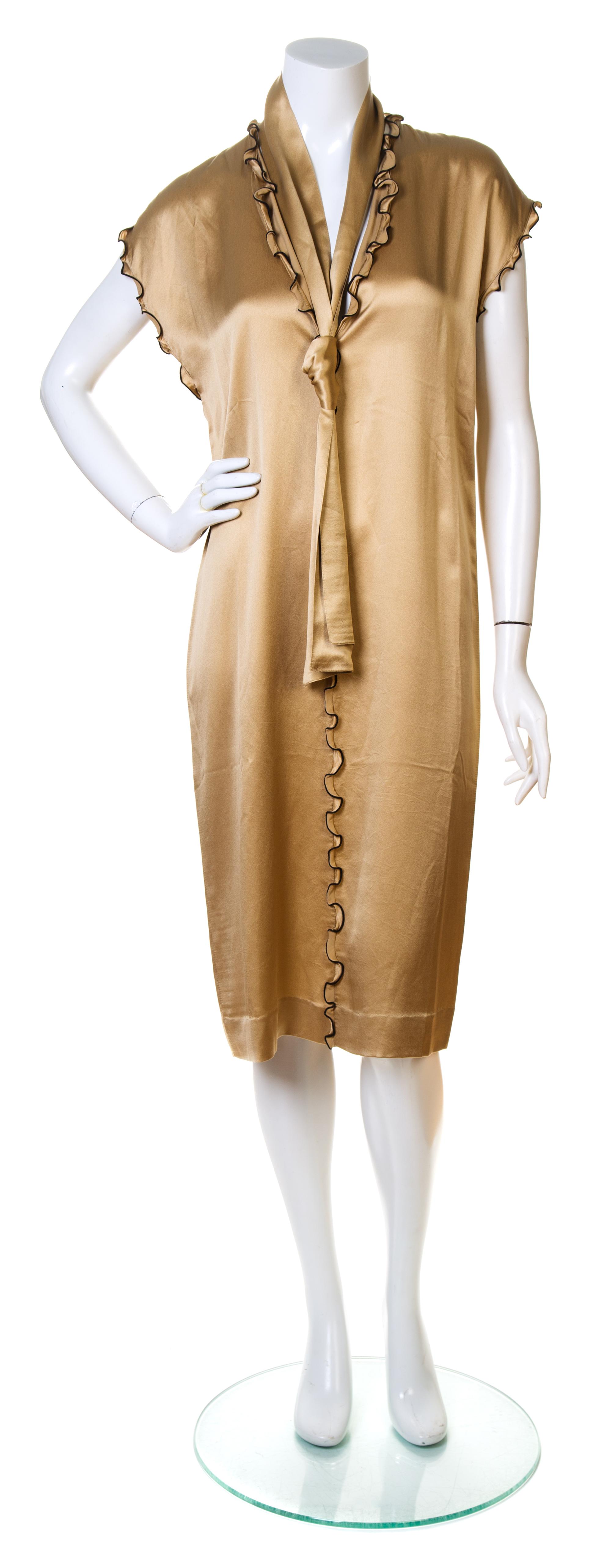 An Yves Saint Laurent Champagne Silk Dress, Size large.