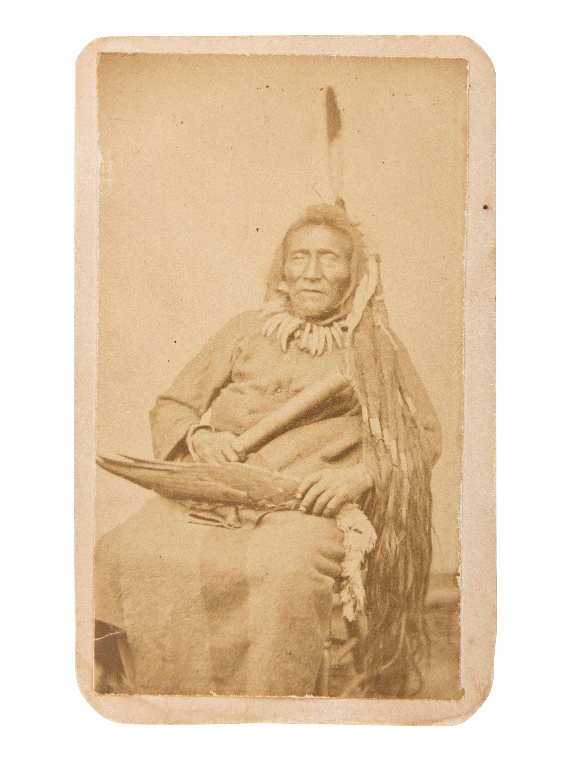[NATIVE AMERICANS]. MORROW, Stanley J., photographer. CDV of subject identified as Yankton Chief Ma-do-ca (The Buck). Yankton, Dakota Territory.