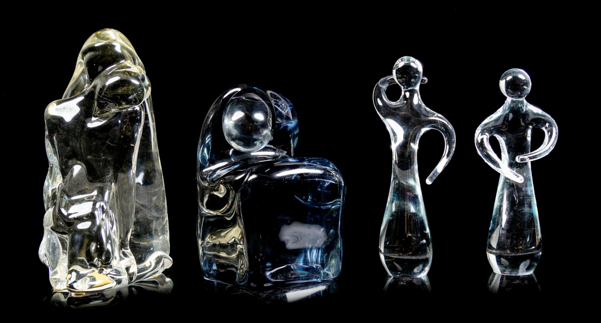 A Group of Four Glass Figural Groups