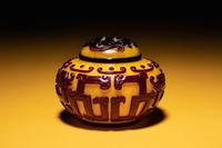 A Small Red Overlay Yellow Peking Glass Covered Jar