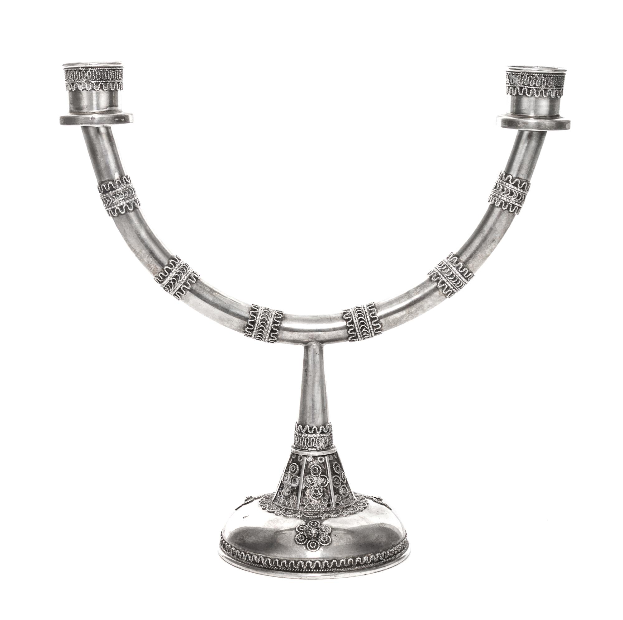 An Israeli Silver Menorah and Sabbath Candelabrum, 20th Century, the detachable top having an eight candle bench with wireworked decora