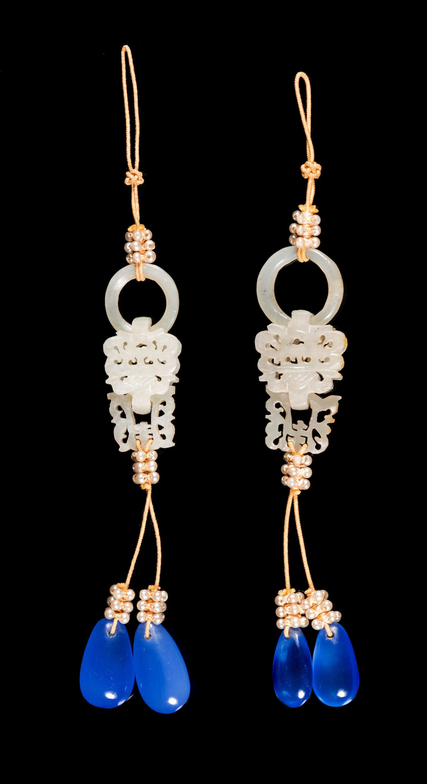 A Pair of Chinese Jade and Blue Glass Pendants