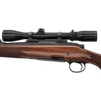 * Remington Model 700 Rifle with Burris Scope and Engraved Receiver