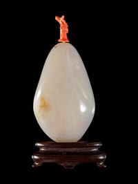 A White Jade Pebble-Form Snuff Bottle