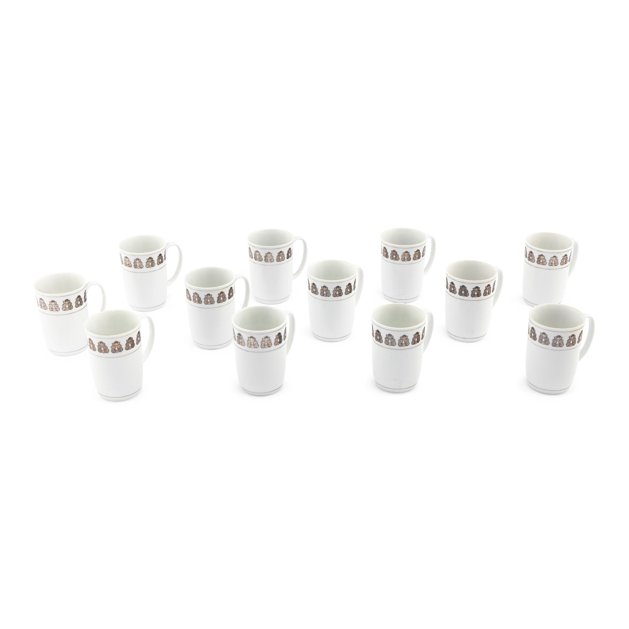 A Set of Twelve Georg Jensen Acorn Porcelain Coffee Mugs