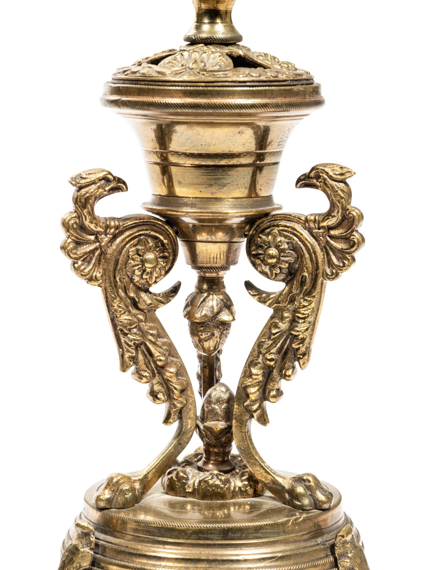 A Pair of Continental Gilt Metal Candlesticks