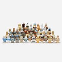 A large collection of mocha, engine-turned, and slip-decorated earthenware, pearlware and yellowware pepper pots late 18th / early 19th century