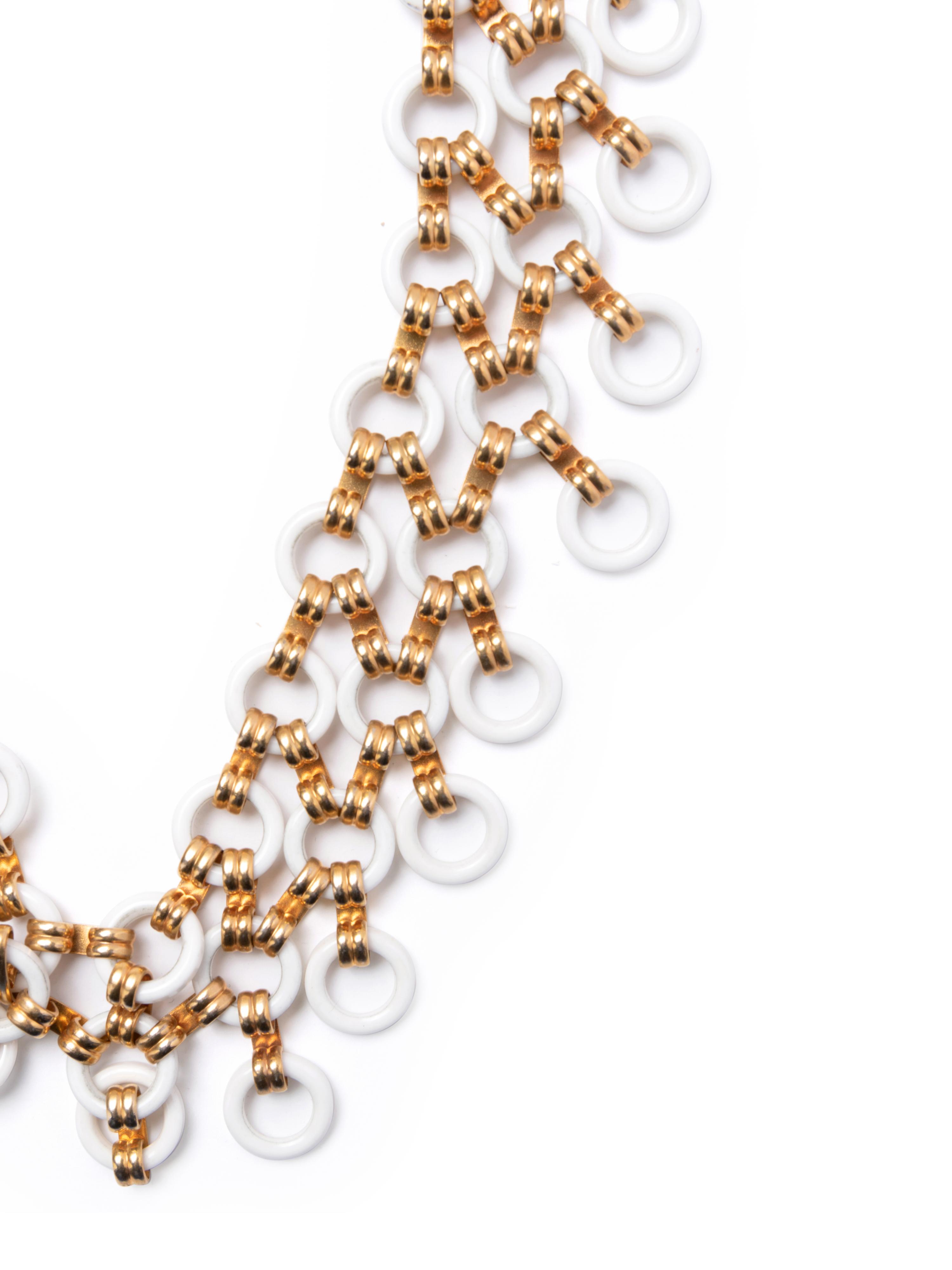 Three Jewelry Items: One Yves Saint Laurent Necklace, One Pair of Dominique Aurientis Ear Clips, and One Pair of Cummings Earrings, 1980s