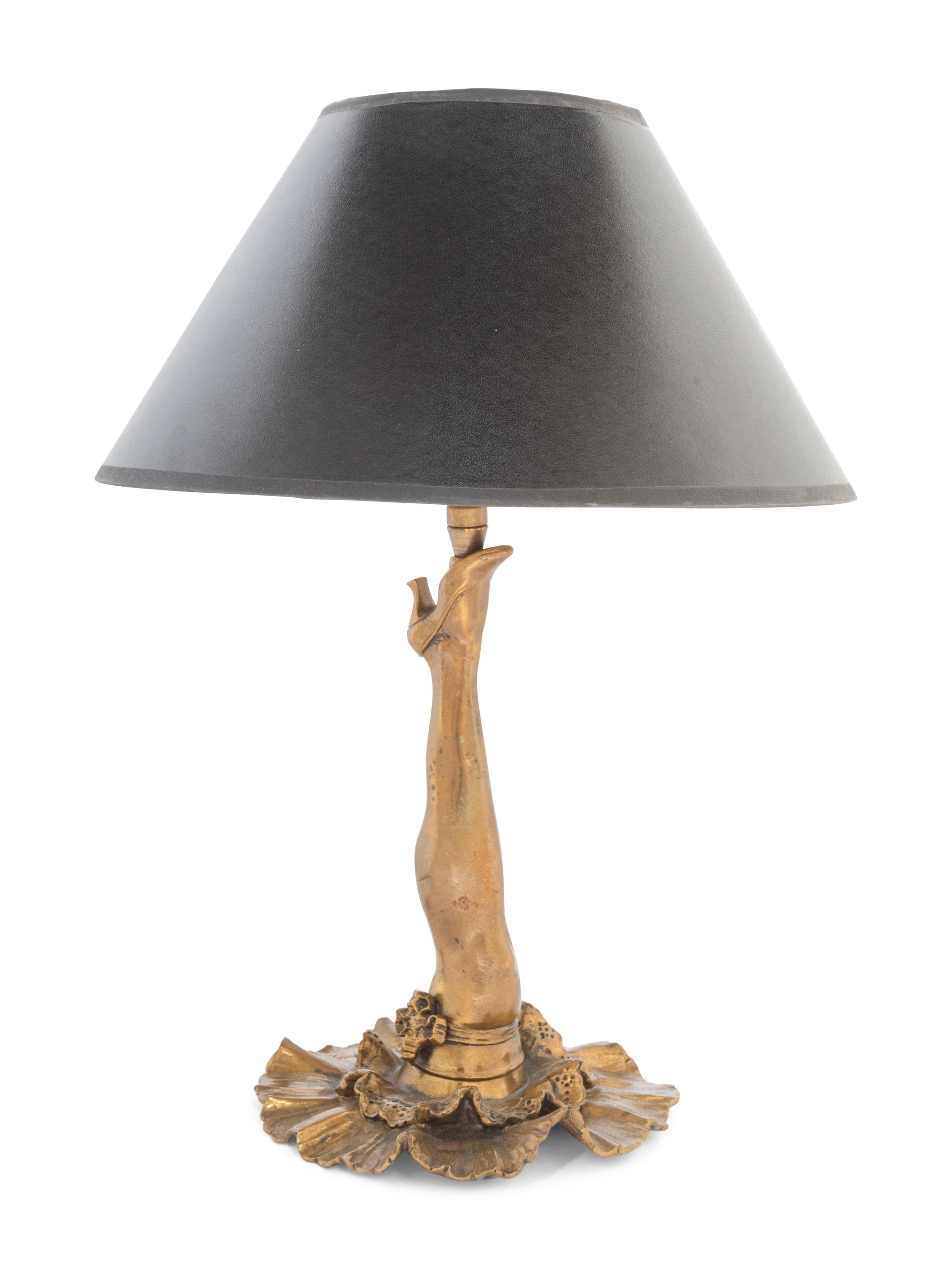 A Whimsical Gilt Metal "Cabaret Leg" Table Lamp