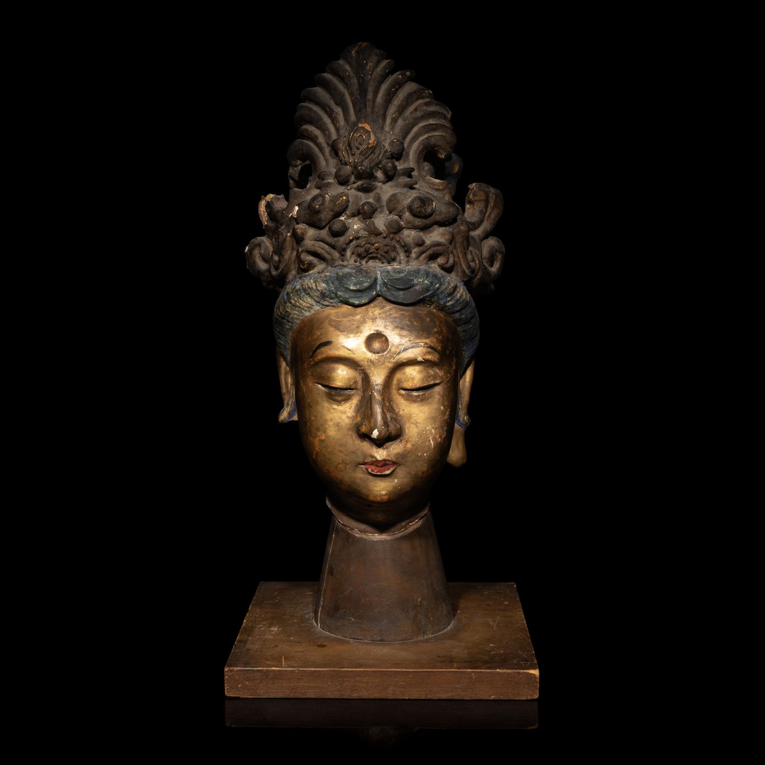 A Chinese Polychrome Painted Stucco Head of a Female Attendant, Song-Ming Dynasty 宋-明 彩繪泥塑侍女頭像