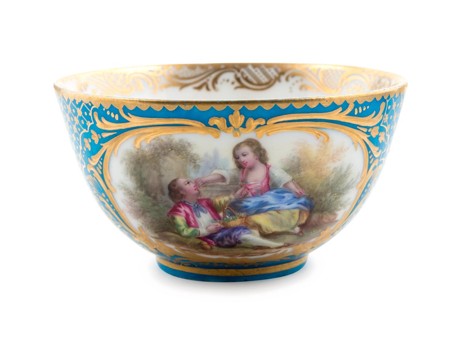 Eight Sèvres Style Painted and Parcel Gilt Porcelain Articles