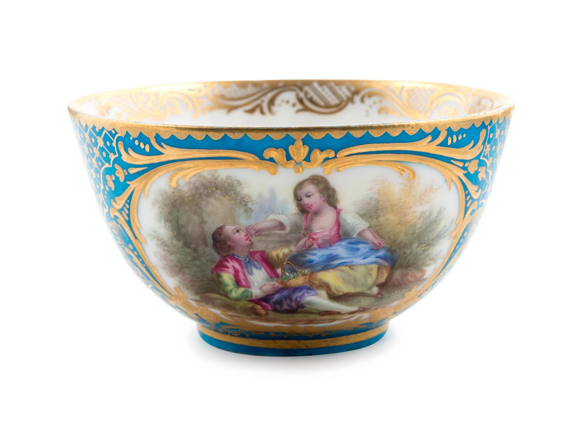 Eight Sèvres Style Painted and Parcel Gilt Porcelain Articles
