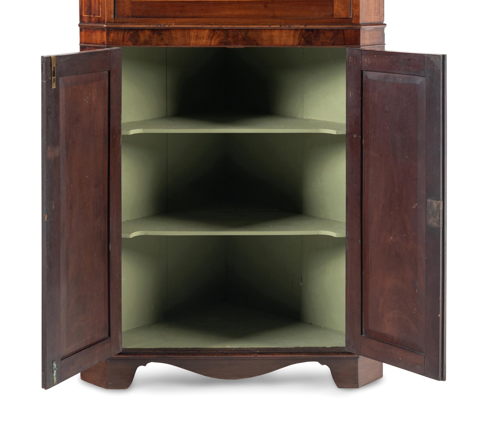 A George III Mahogany Corner Cabinet