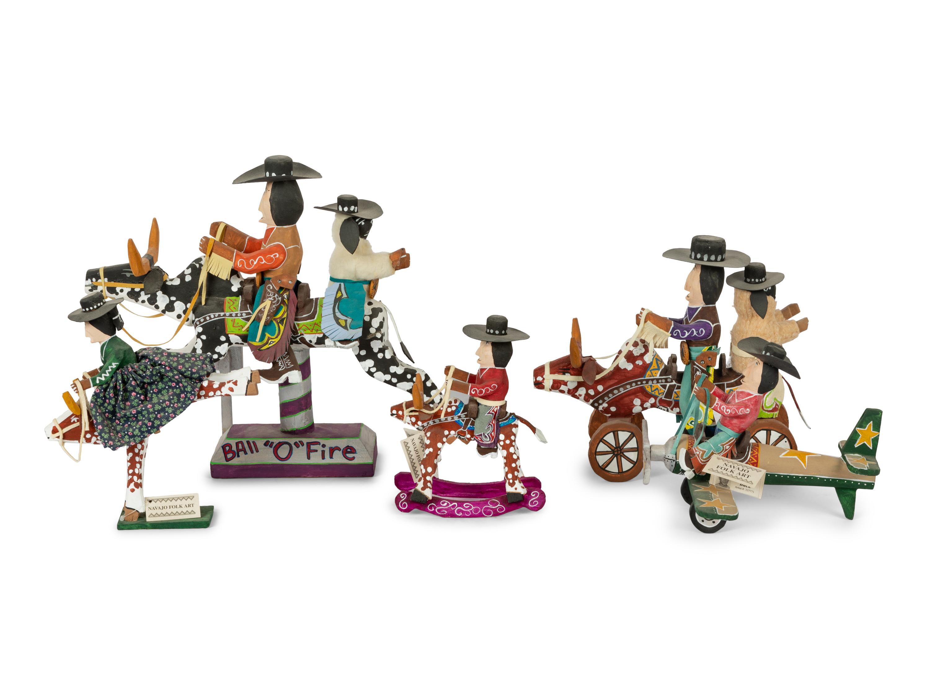 Eight Carved Wood Folk Art Sculptures