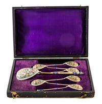 A Set of Russian Silver-Gilt and Enamel Spoons, Mark of Nikanov Zolotov, kokoshnik mark of Ivan Lebedkin, Moscow, late 19th/early 20th