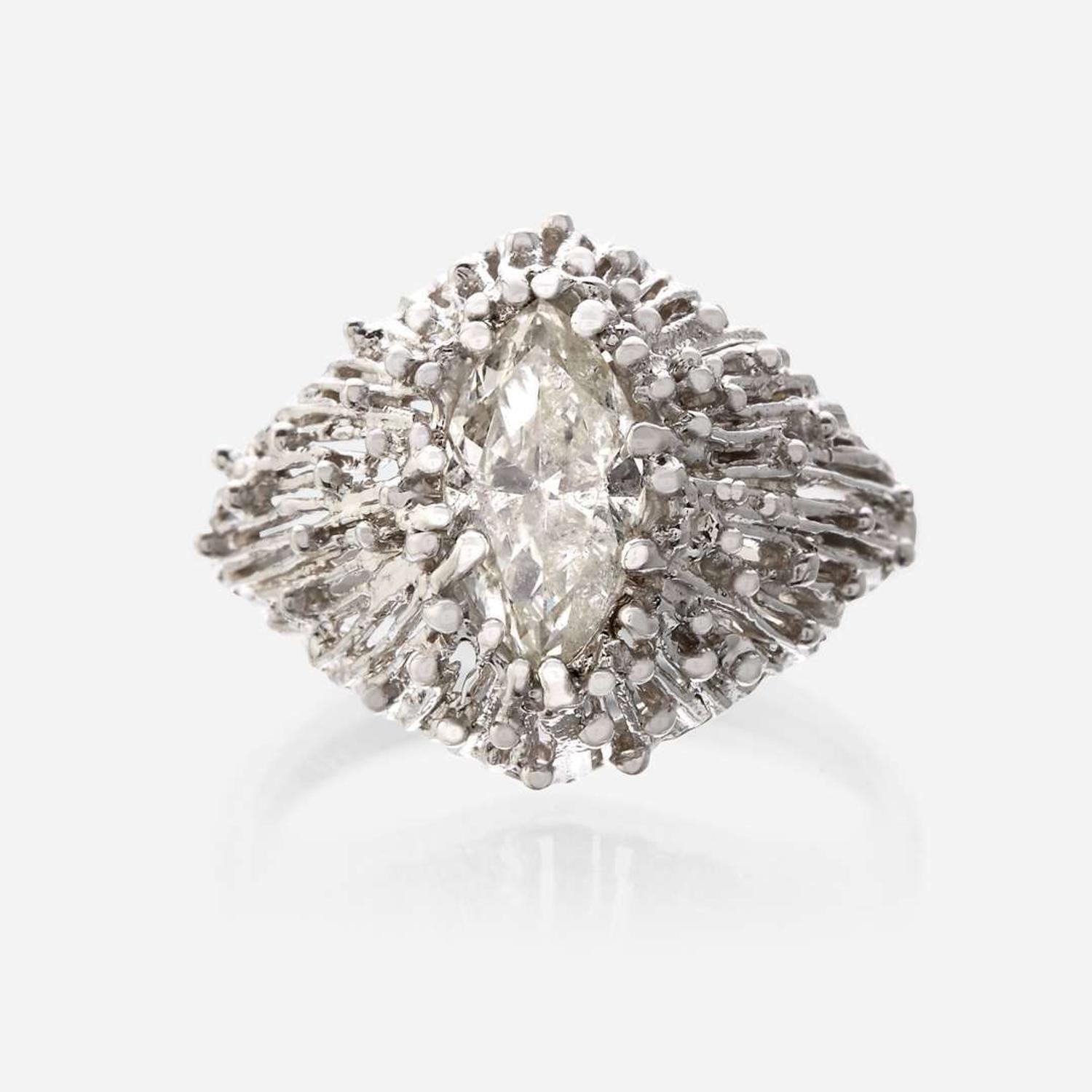 An eighteen karat gold and diamond ring