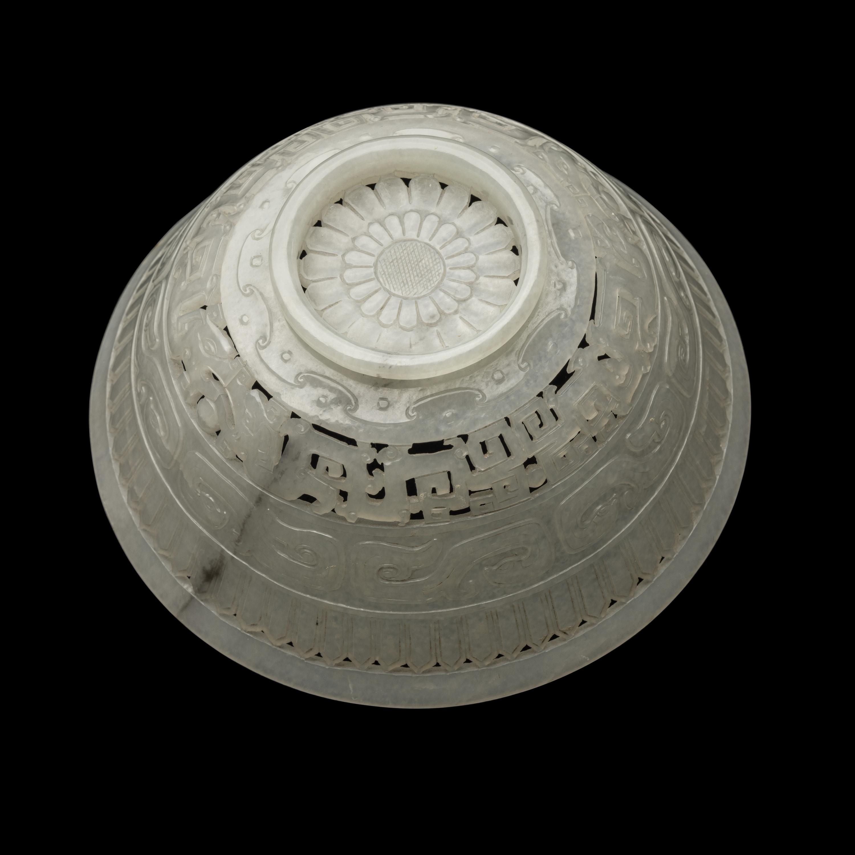 A Chinese Carved and Pierced 'Archaistic' White Jade Bowl and Cover