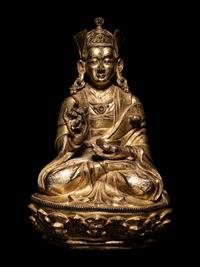 A Tibetan Gilt Bronze Figure of a Seated Karmapa