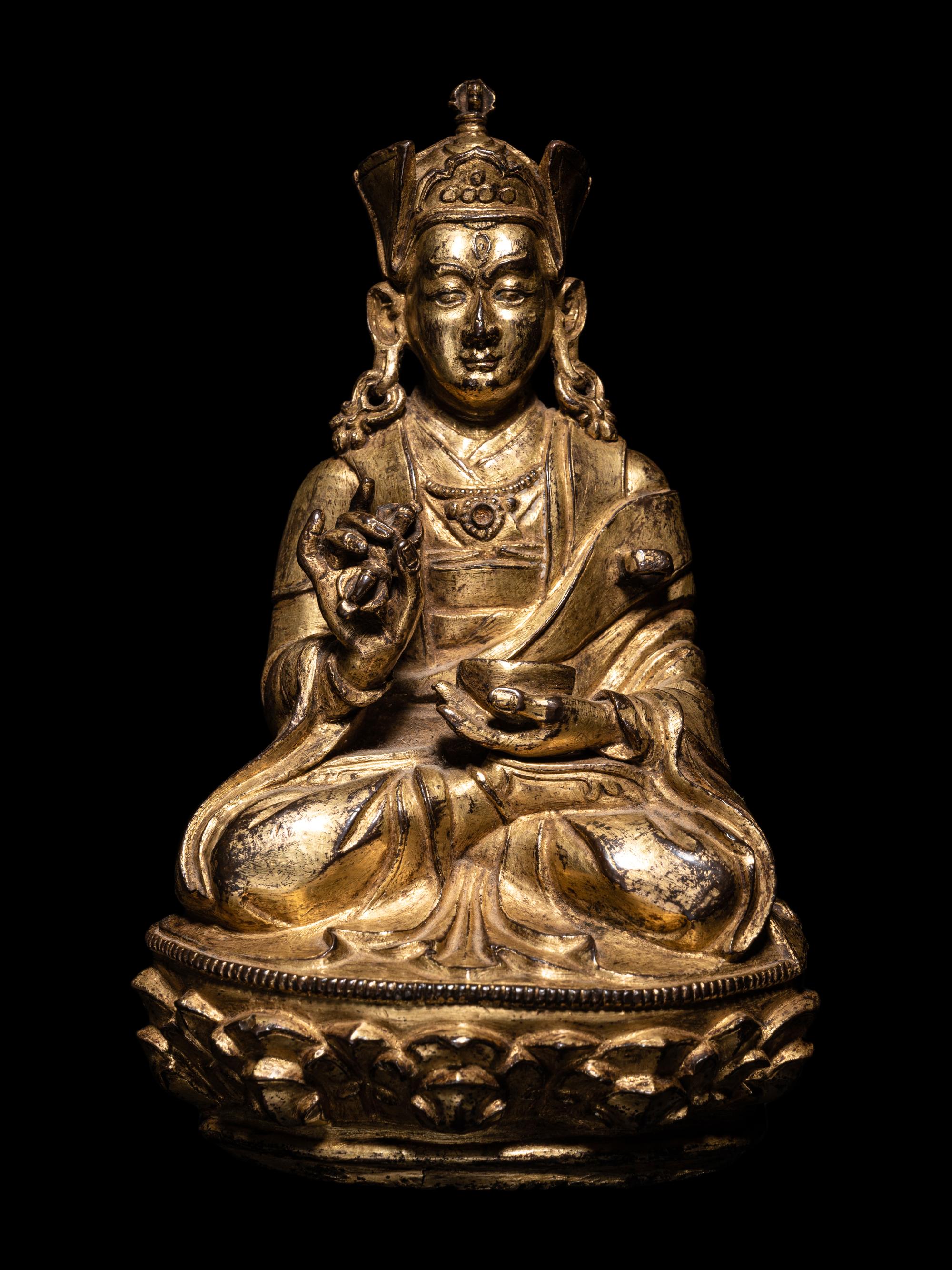 A Tibetan Gilt Bronze Figure of a Seated Karmapa