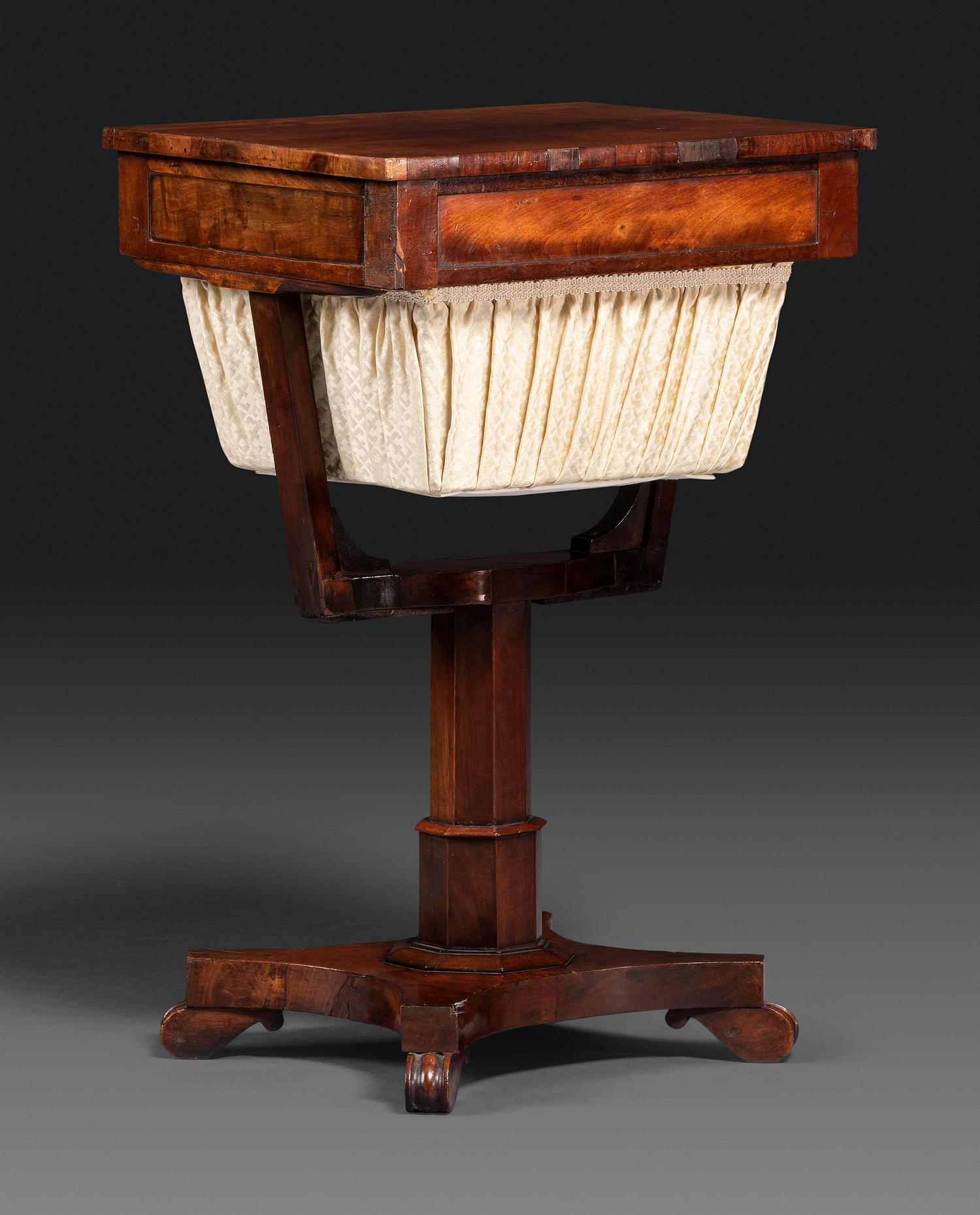 A Late Classical Figured Mahogany Sewing Table