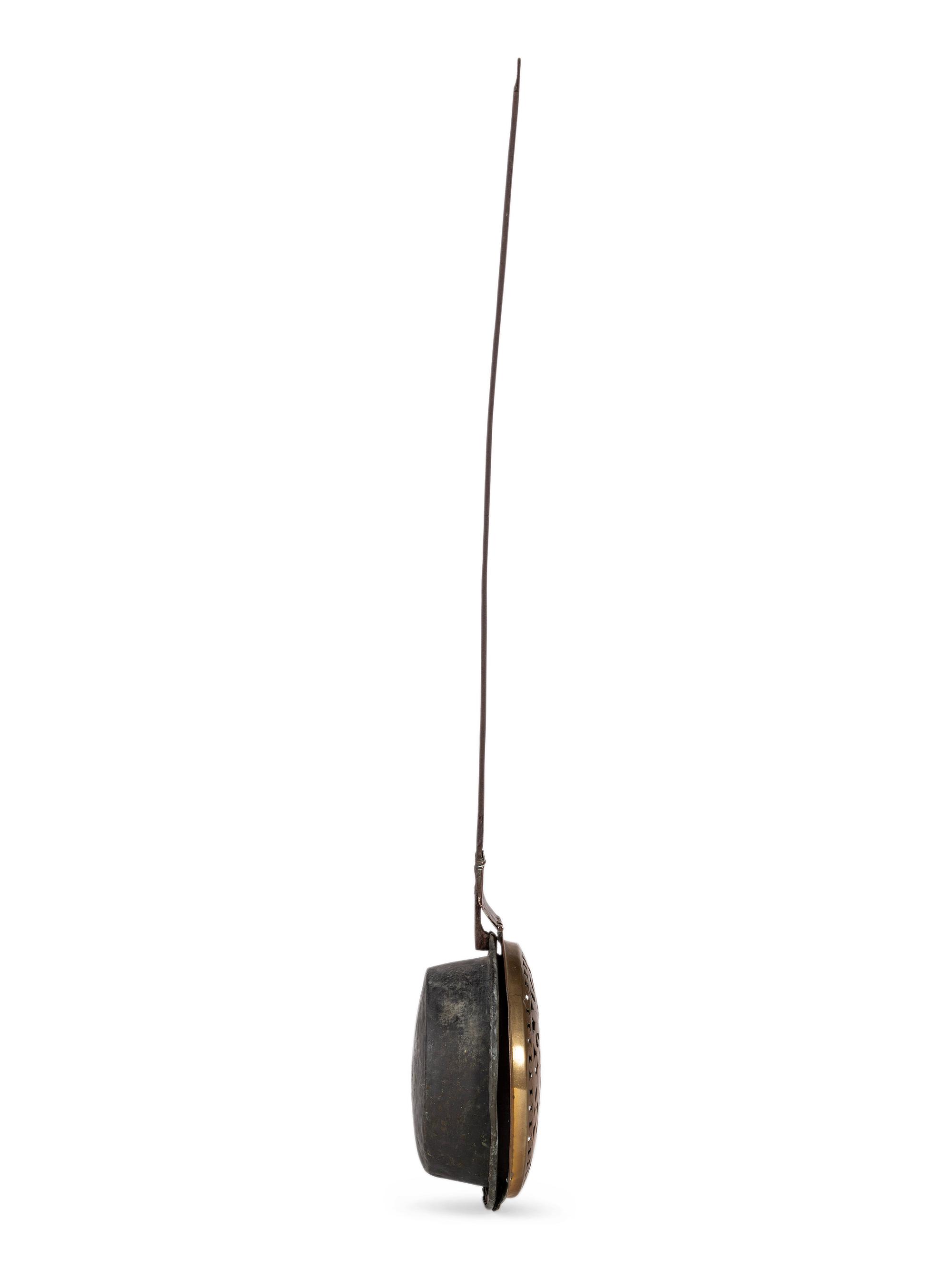 An English Wrought-Iron and Pierced and Engraved Brass Warming Pan