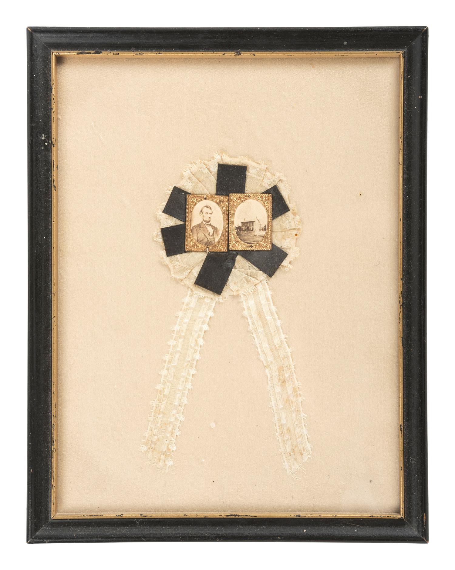 Abraham Lincoln [LINCOLN, Abraham (1809-1865)]. Rare Mourning cockade featuring a pair of albumen images of Abraham Lincoln and his Springfield, Illinois, home.