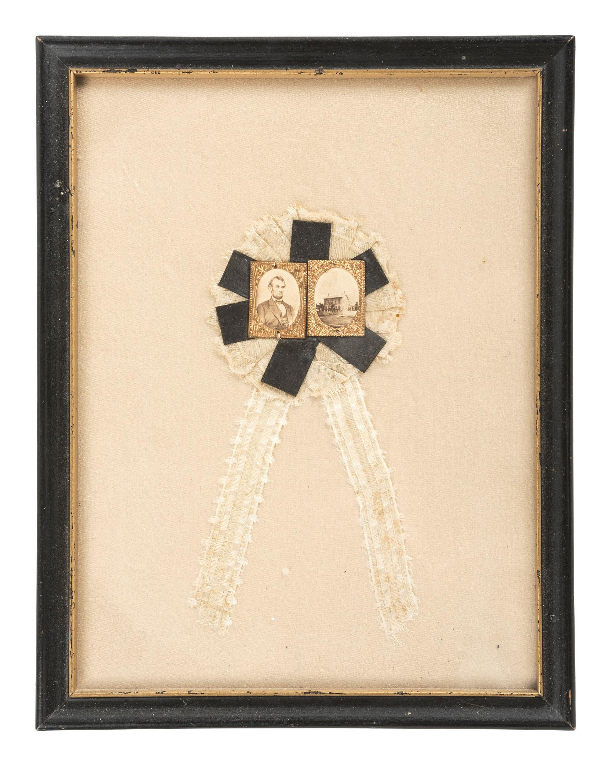 Abraham Lincoln [LINCOLN, Abraham (1809-1865)]. Rare Mourning cockade featuring a pair of albumen images of Abraham Lincoln and his Springfield, Illinois, home.