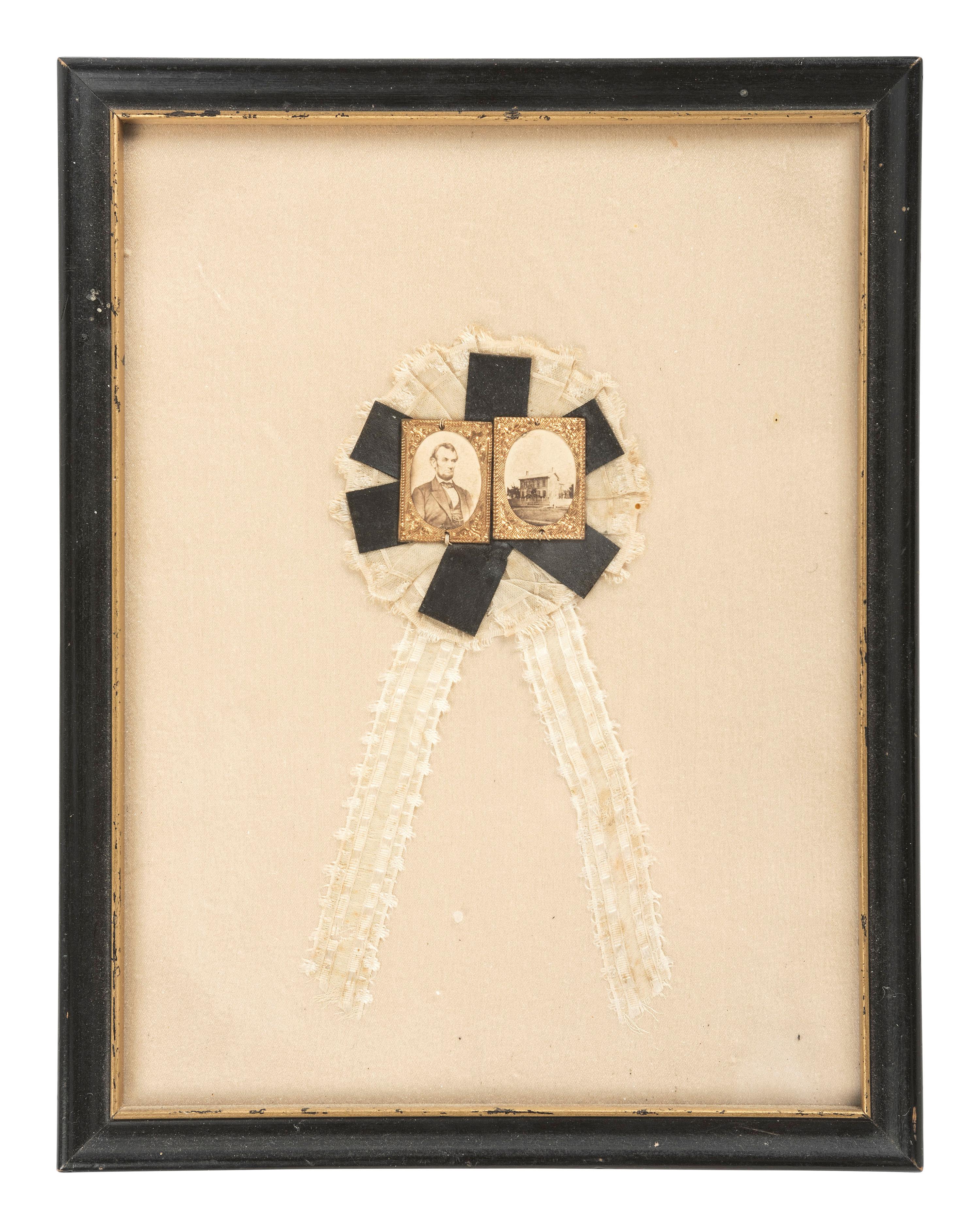 Abraham Lincoln [LINCOLN, Abraham (1809-1865)]. Rare Mourning cockade featuring a pair of albumen images of Abraham Lincoln and his Springfield, Illinois, home.
