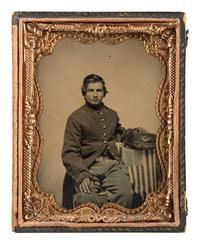 [CIVIL WAR]. A group of 4 items, highlighted by a quarter plate tintype of a Union infantryman posed with an American flag attributed as Joseph Graff, Company D, 23rd Kentucky Infantry.