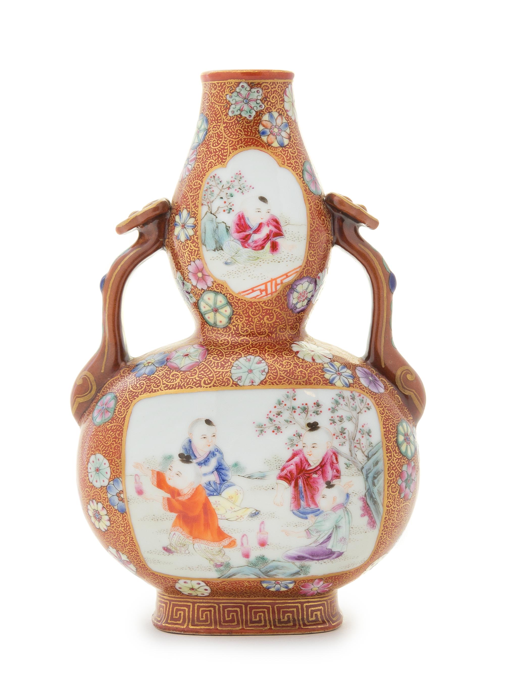 A Famille Rose Double Gourd-Form Porcelain Vase Height 7 3/8 inches.