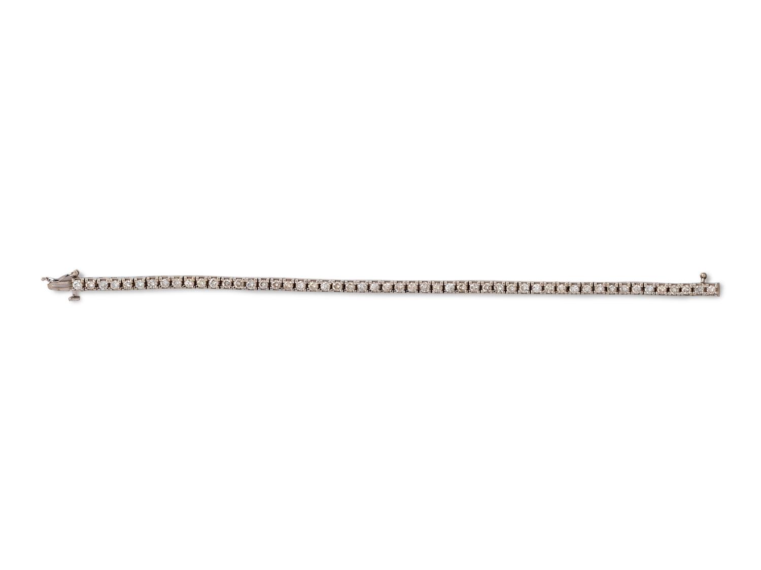 A 14 Karat White Gold and Diamond Line Bracelet,
